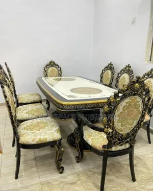 Royal Dining Table With 8 Fabric Chairs