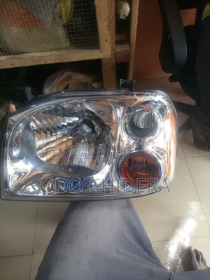 Head Lamp Nissan Frontier Left and Right