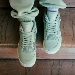 Air Jordan 4 Retro “Sea-Foam Sail” Sneakers