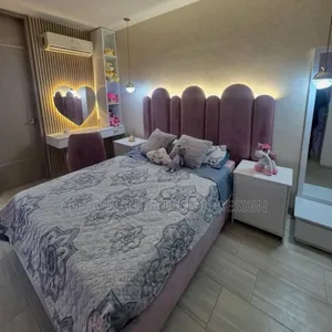 Sleek Bedframe With Bedside Cabinet