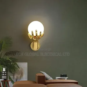 Golden Hand Glass Ball Wall Sconce Light