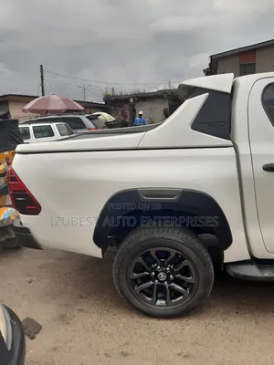 Automatic Roller Boot Cover and TRD Spoiler Hilux Revo