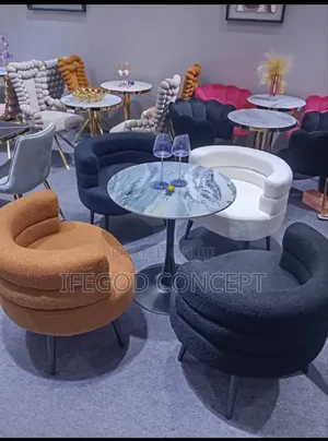 Plush, Barrel-Shaped Armchairs