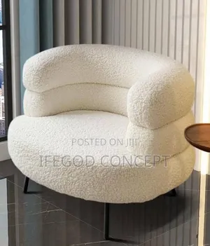 Plush, Barrel-Shaped Armchairs