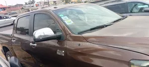 Toyota Tundra Limited 4dr Double Cab 4WD SB (5.7L 8cyl 6A) 2014 Brown