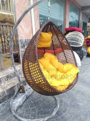 Swing Chair With Yellow Cushions