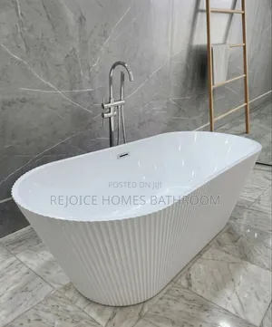 White Modern Oval Free-Standing Fluted Acrylic Bathtub Line Design