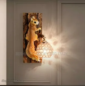 Whimsical Squirrel Resin Wall Sconce Light.