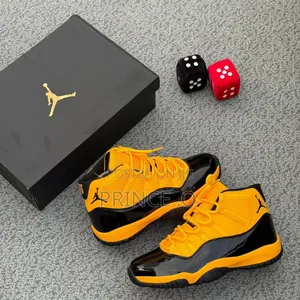 Jordan 11 Retro Yellow and Black Sneakers