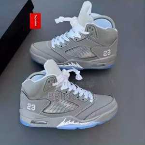Air Jordan 5 Retro Sneakers in Grey.