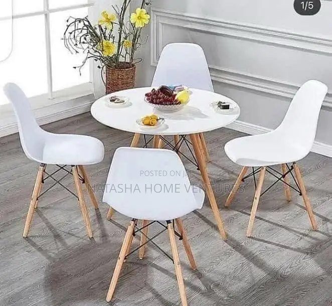Round Dining Table + 4 Eames Chairs