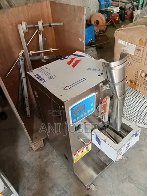 Liquid Filling and Sealing Machine