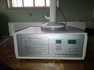 Induction Cup Sealing Machine