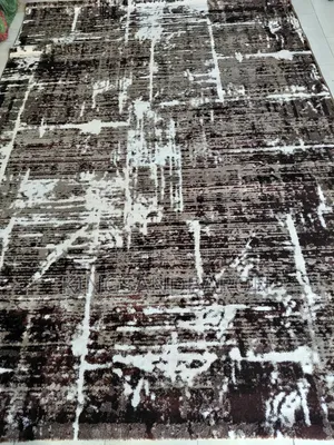 7x10fts Brown and Cream Turkey Center Rug