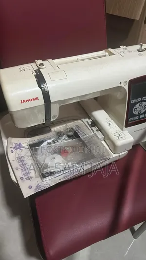 Janome Memory Craft 230e Sewing and Embroidery Machine