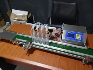 Automatic 4 Nozzle Digital Liquid Filling Machine With Conveyor.