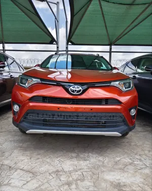 Toyota RAV4 XLE AWD (2.5L 4cyl 6A) 2016 Orange