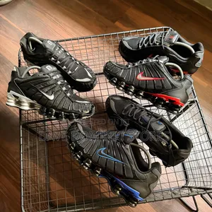 Cop the Nike Shox Tl Black Origin Blue