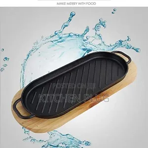 38cm Cast Iron Oval Sizzler Plate With Handle Wooden Serving Base.