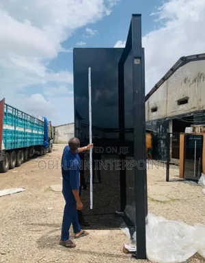 5ft by 12ft Pivot Security Door.