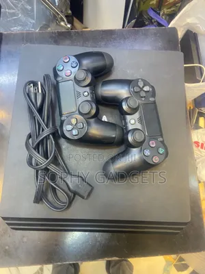 London Used Ps 4 Pro With 2 Pads and 12 Games