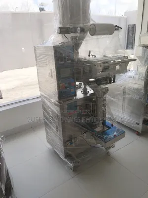 1kg Granule Packaging Machine With Auto Loader and Conveyor