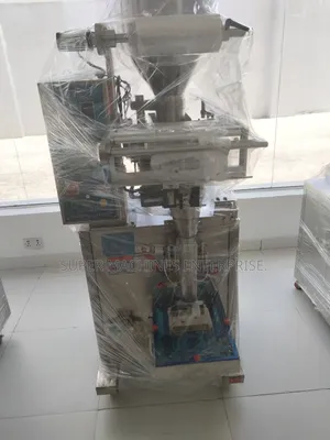 1 Kg Granule Packaging Machine With Auto Loader and Conveyor