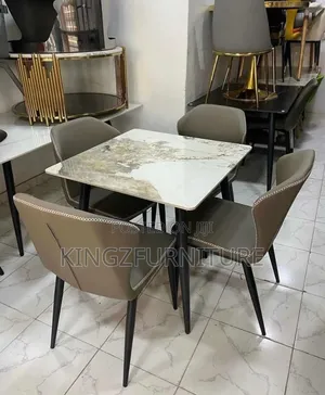 4-Seater Dining Set Features Upholstered Chairs and a Marble Tabletop,