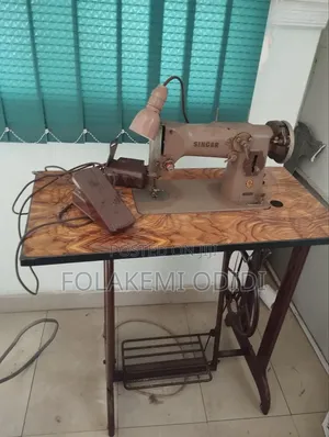 Singer German Used, Electric and Manual, Complete With Leg
