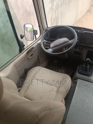 Toyota Coaster 2017 Gold