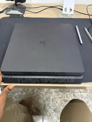 Neatly Used Ps4 Console With 2 Controllers and Installed Games