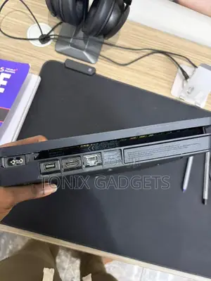 Neatly Used Ps4 Console With 2 Controllers and Installed Games