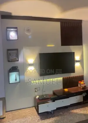 Clean Tv Console With a Shelve