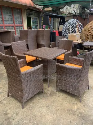 4 Piece Outdoor Rattan Dining Set With Orange Cushions