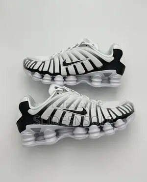 Futuristic Performance Nike Shox Tl Metallic Platinum Sneakers