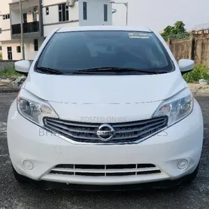 Nissan Versa 1.6 SV 4dr Sedan (1.6L 4cyl CVT) 2014 White