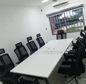 Conference Table by 10 Chairs With Metal Legs