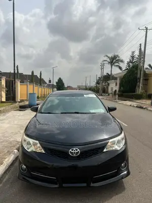 Toyota Camry SE Sport 4dr Sedan w/Prod. End 11/13 (2.5L 4cyl 6A) 2014