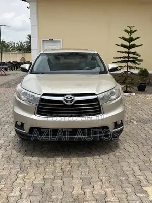 Toyota Highlander XLE 4dr SUV AWD (3.5L 6cyl 6A) 2015 Gold