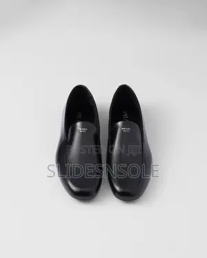 Elegant Prada Brushed Leather Loafers