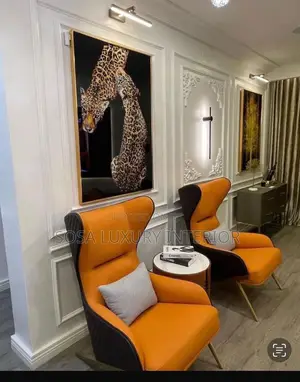 Brand New Orange Wingback Armchairs