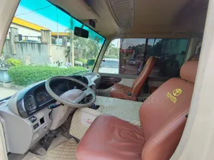 Toyota Coaster 2017 Gold