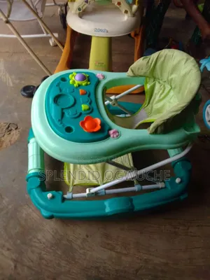 Neat and Clean Fairly Used Foreign Baby Walker Sings