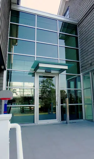 Architectural Transome Installation With Aluminum Door (Automatic)