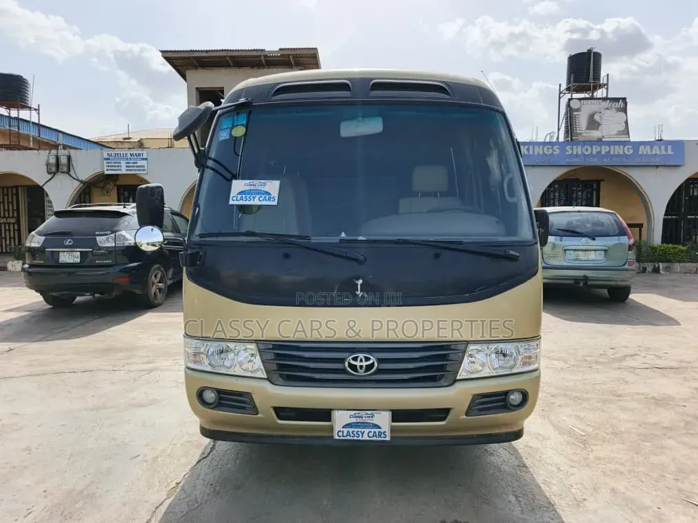 Toyota Coaster 2015 Gold