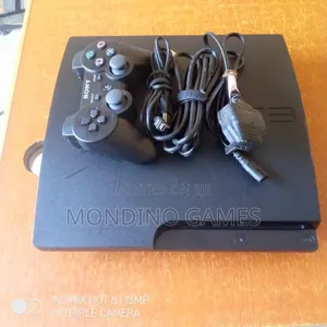 Sony Playstation 3 Slim Console With Two Pads and 10 Games Inside