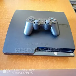 Sony Playstation 3 Slim Console With Two Pads and 10 Games Inside