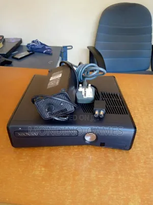 Xbox 360 Slim Console With One Pad and 10 Games Inside