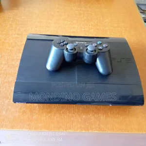 Sony Playstation 3 Super Slim With Two Pads and 10 Games Inside