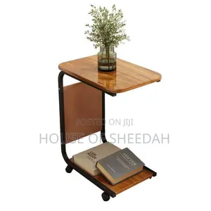 C-Shaped Side Table With Wheels and a Storage Compartment
